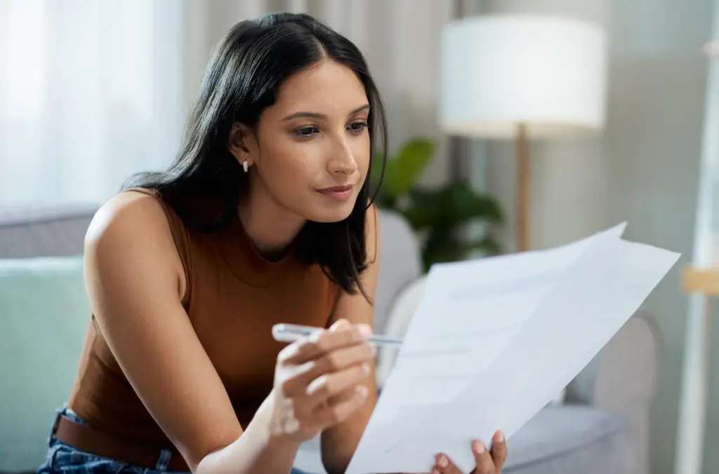 Woman making entries in divorce papers